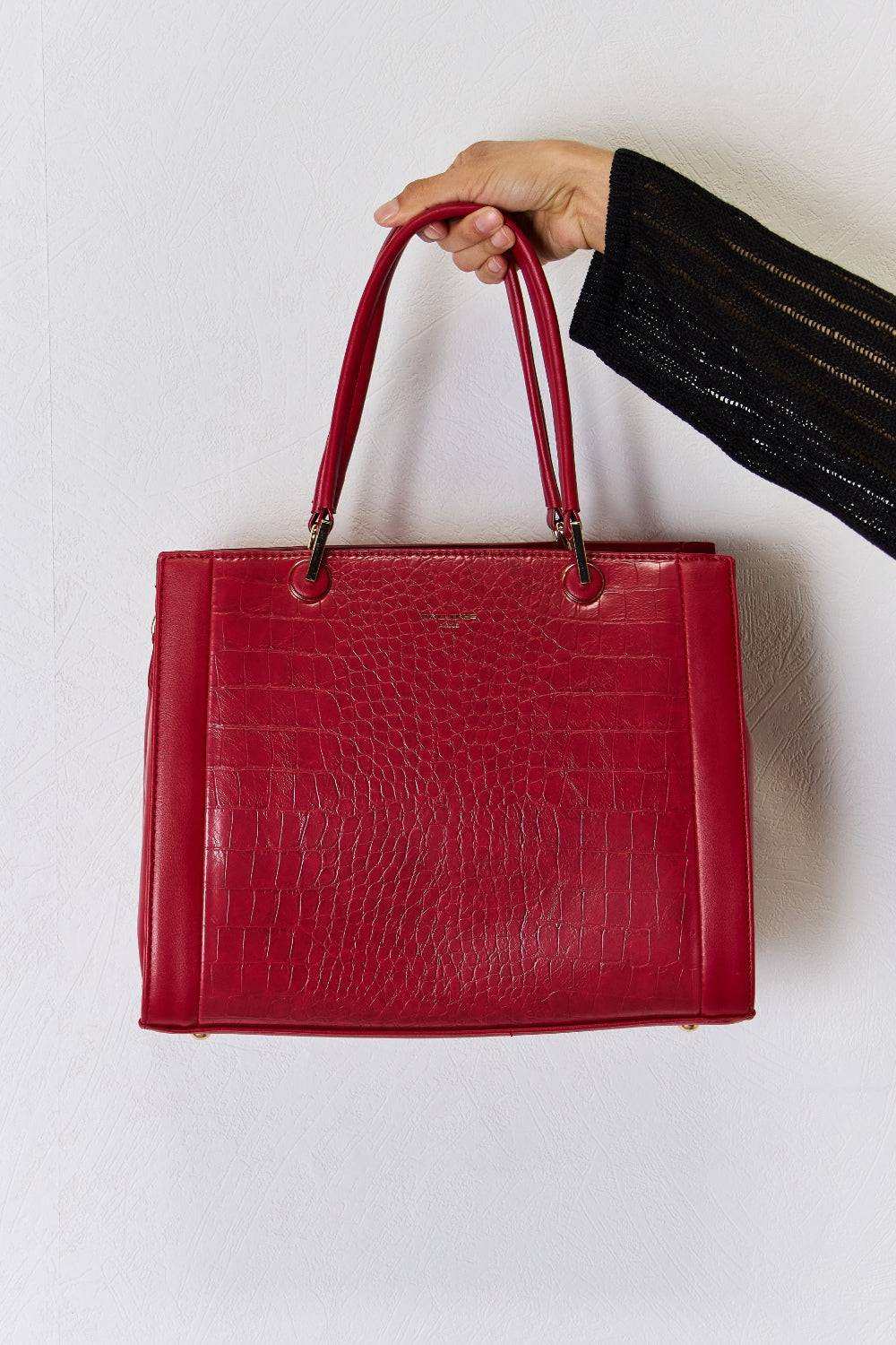 David Jones texture PU leather handbag in red with sturdy handles, stylish design, and spacious interior.