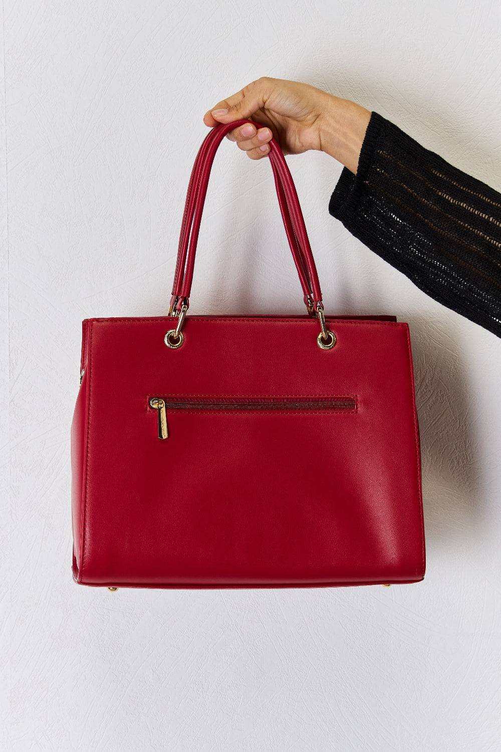 David Jones Texture PU Leather Handbag in red with sturdy handles and detachable shoulder strap.